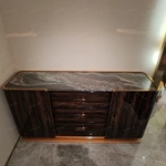 Marble-Top Sideboard Cabinet with Dark Striped Wood Veneer, Rounded Side Doors, and Central Drawer Storage